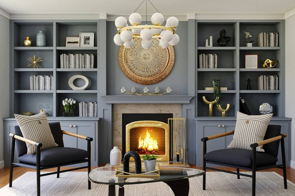 slate blue accent wall in living room with gold and white decor.